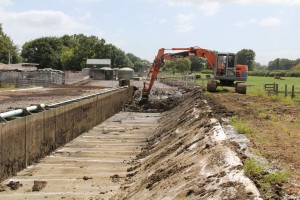 cleaning weeping wall with digger copy